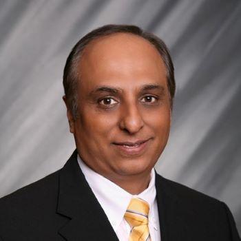 Kam Patel_resized_350 A headshot of a person