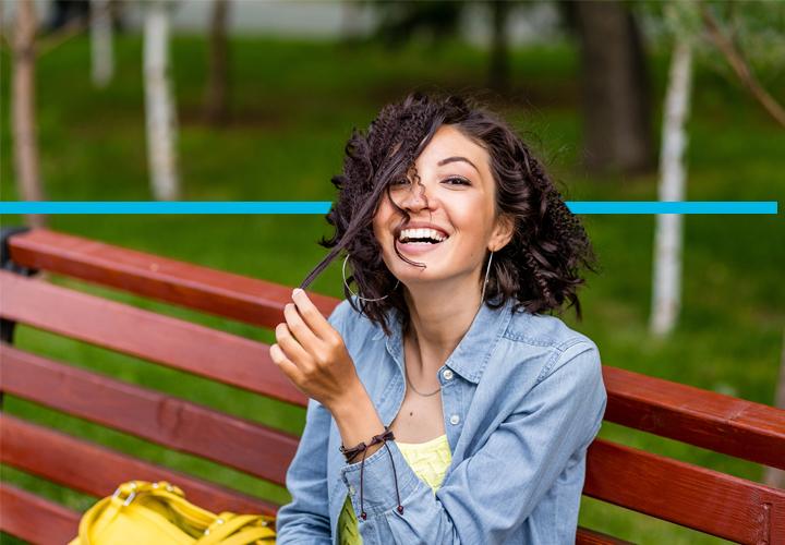 Woman enjoying a day at the park Woman enjoying a day at the park